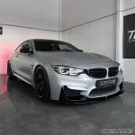Performance Priekinio bamperio Pažeminimas skirtas BMW F80 / F82 / F83, juodas blizgus - V2 SUTVIRTINTA VERSIJA