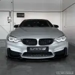 Performance Priekinio bamperio Pažeminimas skirtas BMW F80 / F82 / F83, juodas blizgus - V2 SUTVIRTINTA VERSIJA