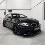 CS-style Priekinis Pažeminimas skirtas BMW M2 F87 (16-21), juodas blizgus - SUSTIPRINTA VERSIJA