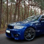 1M išvaizdos Priekinis Bamperis skirtas BMW E81 / E82 / E87 / E88, be PDC, be apiplovimų angų