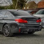 M5-style Difuzorius skirtas BMW G30 / G31 su M-Pack, juodas blizgus